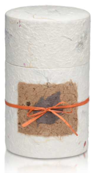 Peaceful Return Biodegradable Urns are made of hand-crafted papers and available in four sizes.

Each urn includes a biodegradable bag, hemp rope, and a seeded paper leaf.

This is a wonderful low-cost alternative to a traditional urn and is a simple and dignified way to honor an individual.

The seeded hand-crafted leaf can be planted to yield wildflower blooms of remembrance.

The urn can be buried or used as a scattering urn with the special spout design.

Dimensions: 11.25″ H x 6.75″ W x 5.5″ D

Capacity: 215 cu. in. Pricing: $135 includes shipping