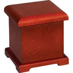 A simple and elegant wood keepsake urn in a medium walnut finish. The simple lines of the KU2-LL give an element of character as well as the flexibility needed to be appropriate for any use. Can be tastefully and subtly displayed in any location. As with our other urns the KU2-LL is fully finished inside and out, seals with plated machine screws and is finished with eight coats of durable urethane.

Specifications: 
Timeless Classic Design
Fully Lined
Hand Crafted
Hand Rubbed
Personalizable via all levels of our laser engraving.
17 Cu In Capacity

Dimensions:
  Width: 4"
  Height: 4 1⁄8"
  Length: 4"