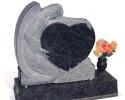 An angel hugging a heart will watch over your loved ones on this single upright monument.