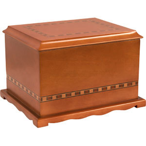 An elegant wood urn in a light walnut finish with wood inlay. The U1-AL adds the perfect amount of design flair and craftsmanship to the basic wood urn. As with our other urns the U1-AL is fully finished inside and out, seals with plated machine screws and is finished with eight coats of durable urethane.

Specifications: 
Wooden Inlay Design
Fully Lined
Hand Crafted
Hand Rubbed
Personalizable via all levels of personalization.
205 Cu In Capacity

Dimensions:
  Width: 7 1⁄2"
  Height: 6 3⁄16"
  Length: 9 7⁄16"