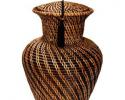 The Chaparral urn is an urn of classic basic design, handcrafted from rattan.  Used in conjunction with a natural cotton and Biobag this urn is fully and completely biodegradable.  Even the packaging of this urn is natural and degradable.
For those whose environmental sensitivities mandate a zero impact urn, the Chaparral urn is a perfect choice.

Specifications: 
Hand Crafted
Biodegradable
210 Cu In Capacity

Dimensions:
  Width: 8 1⁄2"
  Height: 13"
  Length: 8 1⁄2"